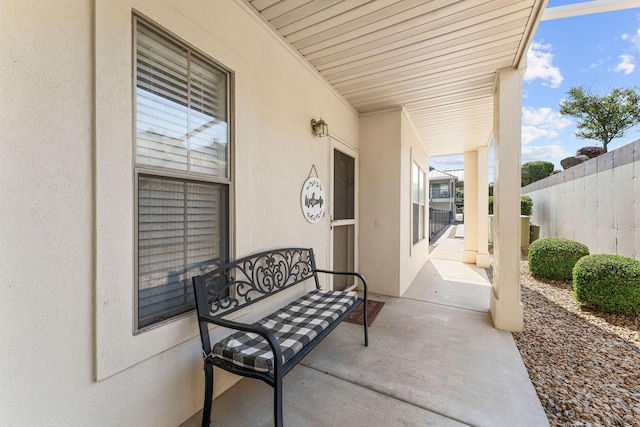 view of patio / terrace featuring fence