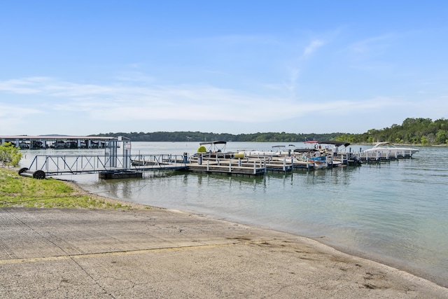 dock featuring a boat ramp and a water view
