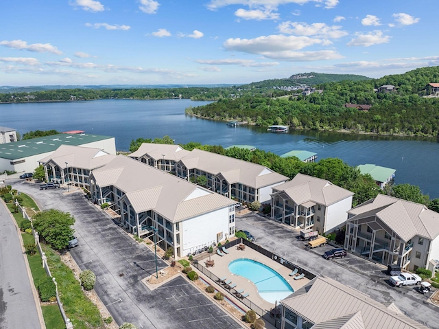 bird's eye view of a large body of water and a pool area
