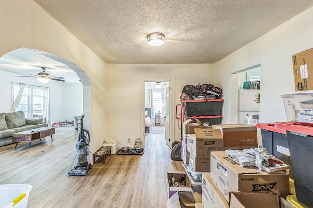 storage area featuring a ceiling fan