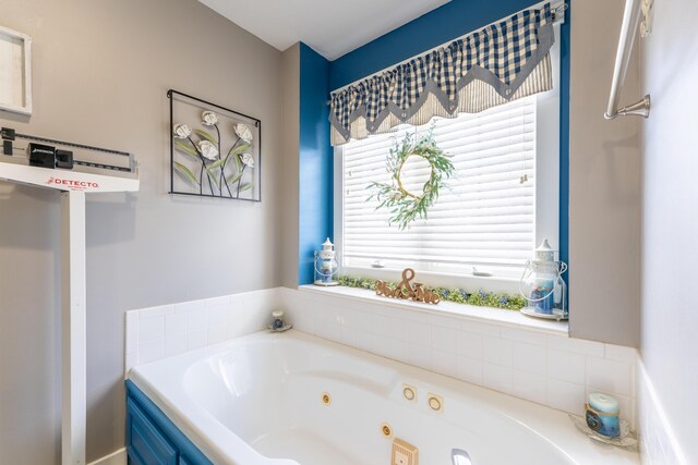 522 E Grace St, Republic, MO 65738 - bathroom featuring a tub with jets