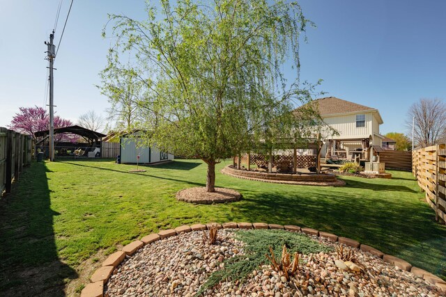 522 E Grace St, Republic, MO 65738 - view of yard with a gazebo, a shed, and an outdoor structure