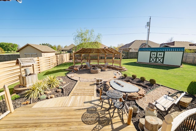 522 E Grace St, Republic, MO 65738 - deck with a fire pit, a storage unit, a gazebo, and an outdoor structure