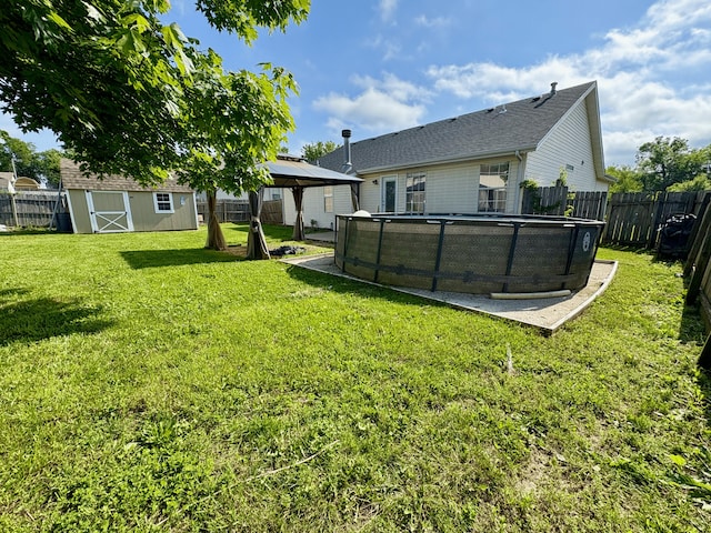 707 S Eastridge, Nixa, MO 65714 - back of property featuring a gazebo and a shingled roof