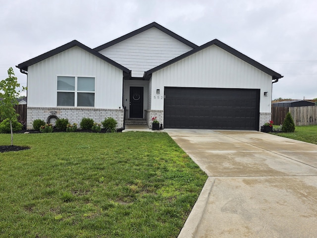 552 S Michelle Ave, Republic, MO 65738 - view of front facade with an attached garage, brick siding, and concrete driveway