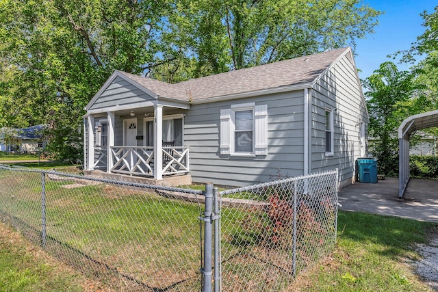 2221 W Nichols St, Springfield, MO 65802 - bungalow featuring a porch and roof with shingles