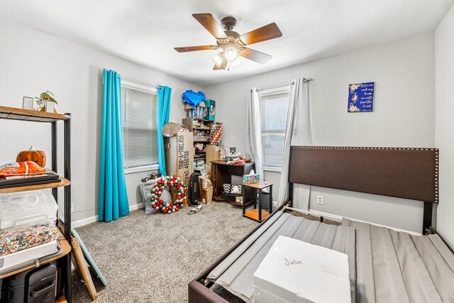 2221 W Nichols St, Springfield, MO 65802 - playroom featuring carpet flooring, a ceiling fan, and baseboards