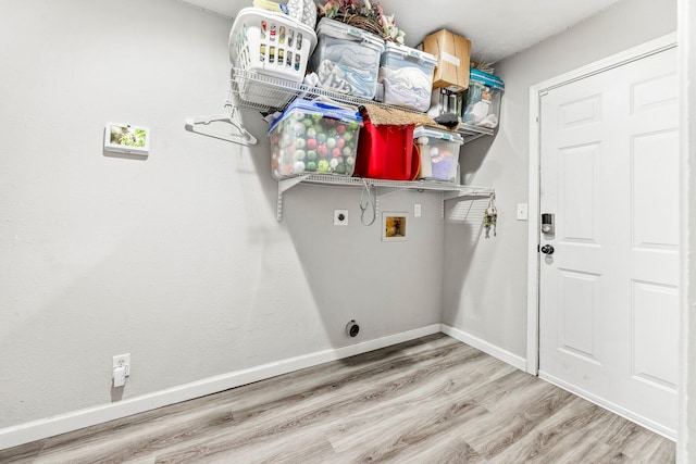 2221 W Nichols St, Springfield, MO 65802 - washroom featuring electric dryer hookup, hookup for a washing machine, wood finished floors, and baseboards