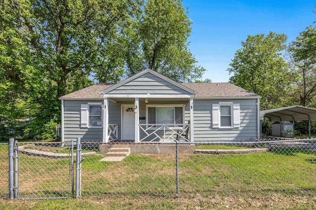 2221 W Nichols St, Springfield, MO 65802 - bungalow-style house with a porch, roof with shingles, a carport, and a gate