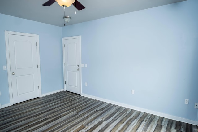 358 High Ridge Rd, Marshfield, MO 65706 - unfurnished room featuring dark wood-style flooring, ceiling fan, and baseboards