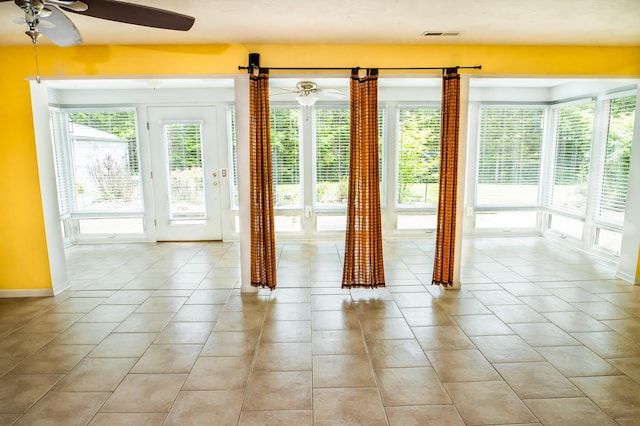 358 High Ridge Rd, Marshfield, MO 65706 - entryway featuring ceiling fan, healthy amount of natural light, and light tile patterned flooring