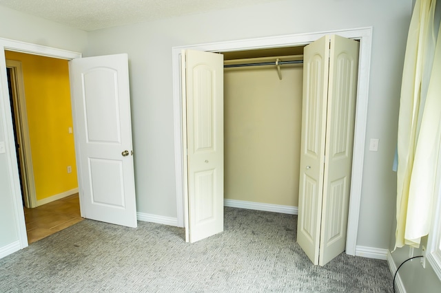 358 High Ridge Rd, Marshfield, MO 65706 - unfurnished bedroom with carpet flooring, a closet, and baseboards