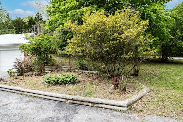 358 High Ridge Rd, Marshfield, MO 65706 - view of side of property with a garage and metal roof