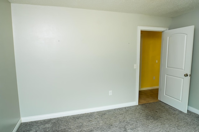 358 High Ridge Rd, Marshfield, MO 65706 - unfurnished room featuring dark carpet and baseboards
