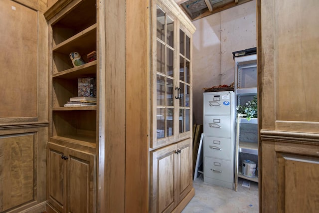 5853 S Northern Ridge Rd, Springfield, MO 65810 - kitchen with concrete floors, open shelves, and brown cabinetry