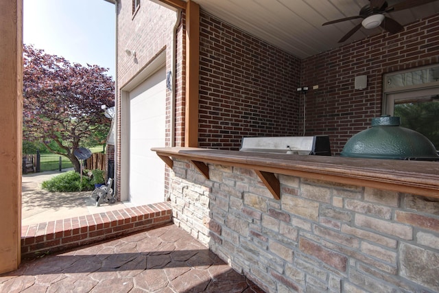 5853 S Northern Ridge Rd, Springfield, MO 65810 - view of patio with a ceiling fan and area for grilling