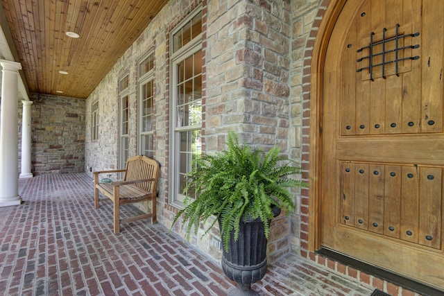 5853 S Northern Ridge Rd, Springfield, MO 65810 - property entrance featuring a porch and brick siding