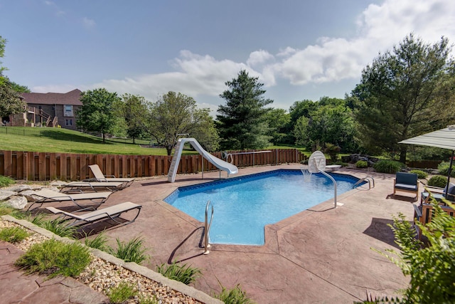 5853 S Northern Ridge Rd, Springfield, MO 65810 - view of pool with a water slide, a patio, and a fenced backyard