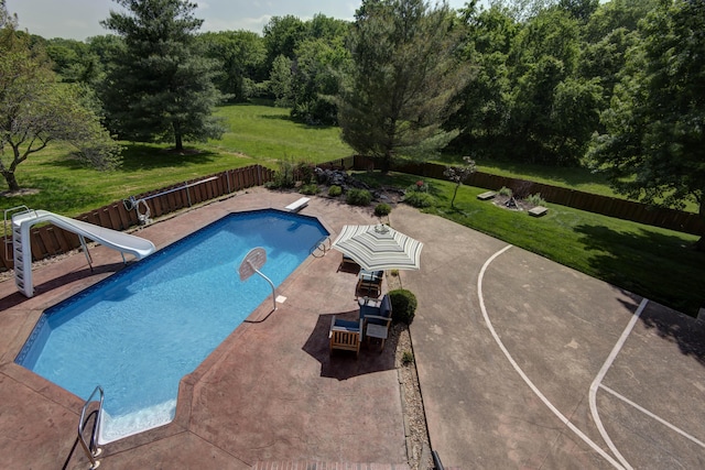 5853 S Northern Ridge Rd, Springfield, MO 65810 - view of pool with a water slide, a diving board, a patio area, and a forest view