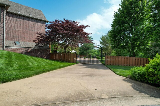 5853 S Northern Ridge Rd, Springfield, MO 65810 - view of concrete surface featuring a gate and a gated entry