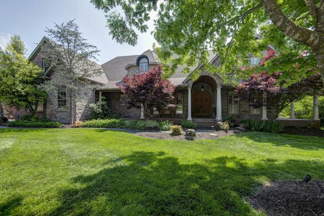 5853 S Northern Ridge Rd, Springfield, MO 65810 - tudor home with stone siding and a front yard