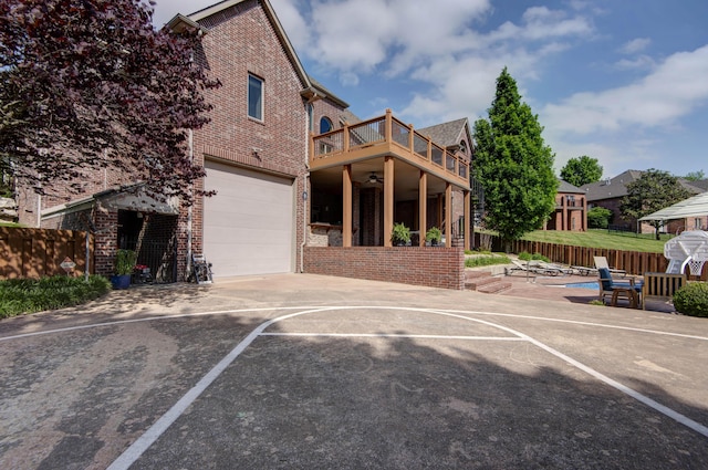 5853 S Northern Ridge Rd, Springfield, MO 65810 - view of basketball court featuring fence