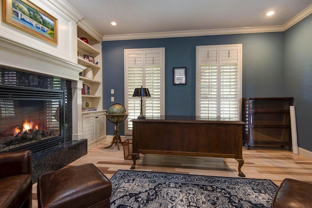 5853 S Northern Ridge Rd, Springfield, MO 65810 - home office featuring light wood-style floors, a premium fireplace, ornamental molding, built in features, and baseboards