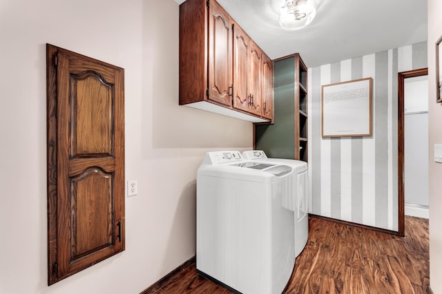 340 Greene Rd, Sparta, MO 65753 - laundry room featuring washer and dryer, cabinet space, dark wood-type flooring, baseboards, and wallpapered walls