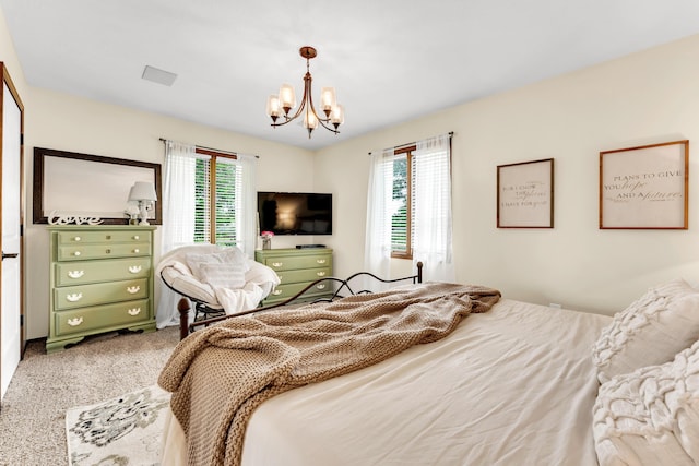 340 Greene Rd, Sparta, MO 65753 - bedroom featuring a chandelier and multiple windows