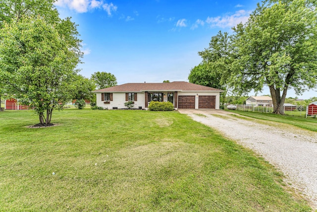 340 Greene Rd, Sparta, MO 65753 - ranch-style house featuring driveway and an attached garage