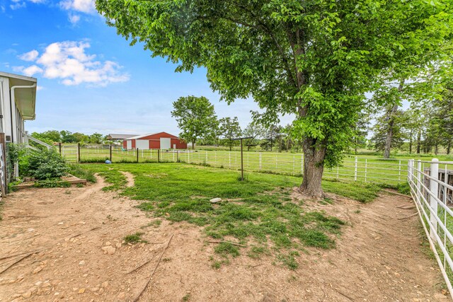 340 Greene Rd, Sparta, MO 65753 - view of yard with a view of countryside, an outdoor structure, and fence