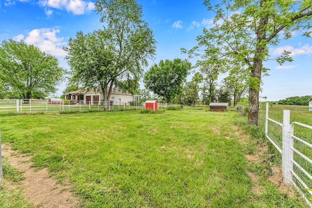 340 Greene Rd, Sparta, MO 65753 - view of yard featuring a view of countryside, an outbuilding, and an exterior structure