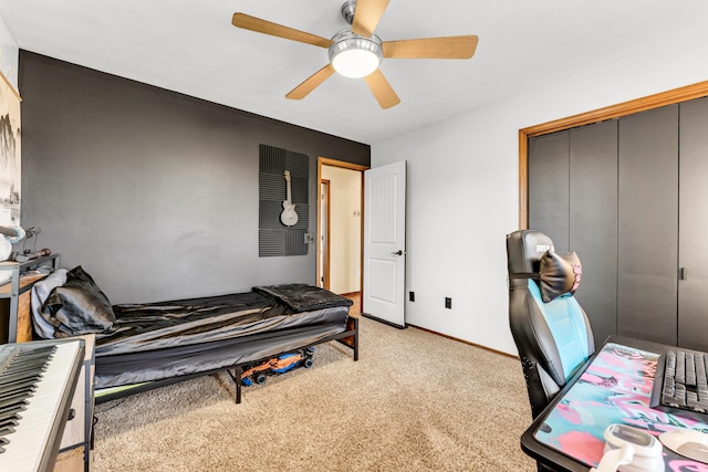 340 Greene Rd, Sparta, MO 65753 - carpeted bedroom with a closet, a ceiling fan, and baseboards
