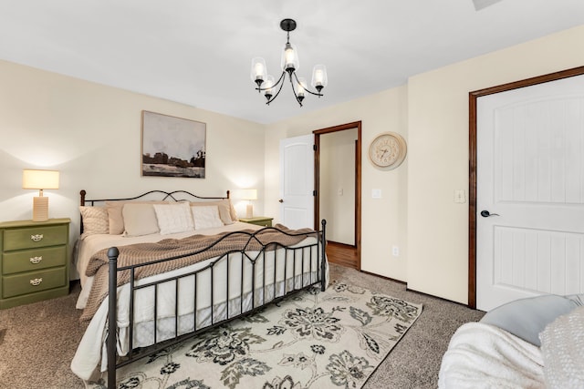 340 Greene Rd, Sparta, MO 65753 - bedroom featuring carpet floors and a chandelier