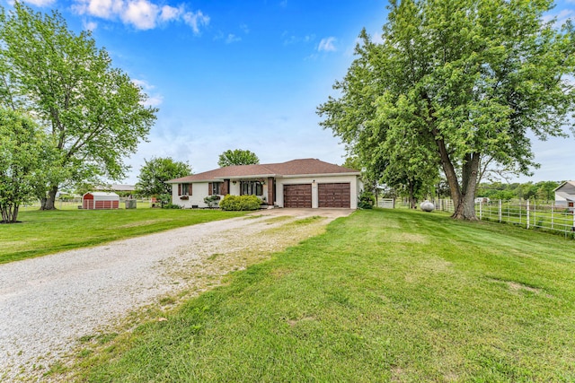 340 Greene Rd, Sparta, MO 65753 - ranch-style house featuring driveway and a garage