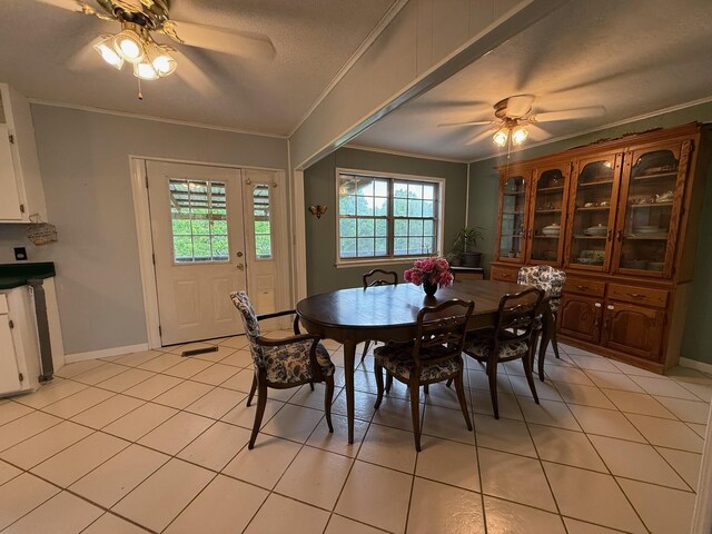 3036 P Hwy, Alton, MO 65606 - dining space with ceiling fan, ornamental molding, light tile patterned flooring, and baseboards