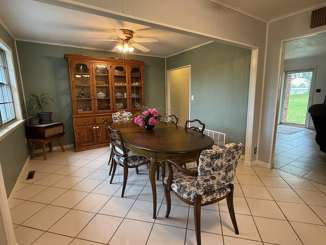 3036 P Hwy, Alton, MO 65606 - dining room featuring light tile patterned floors, ornamental molding, ceiling fan, and baseboards