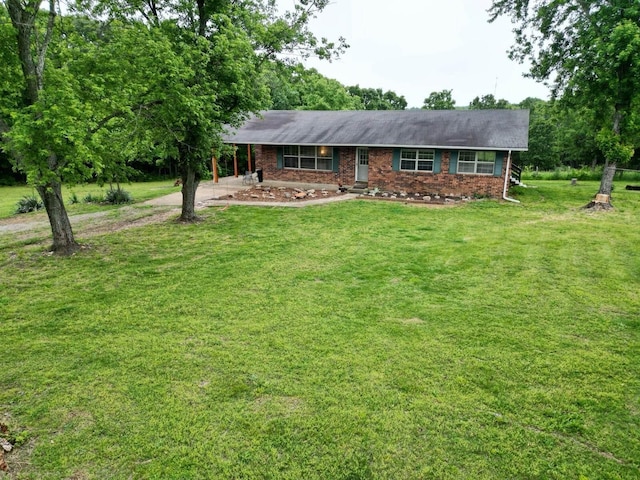 3036 P Hwy, Alton, MO 65606 - ranch-style home with dirt driveway, brick siding, a front lawn, and an attached carport