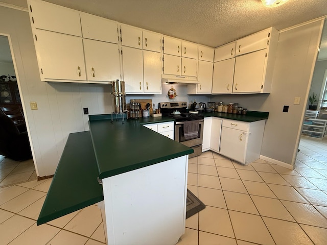 3036 P Hwy, Alton, MO 65606 - kitchen with stainless steel range with electric cooktop, dark countertops, light tile patterned floors, and a textured ceiling