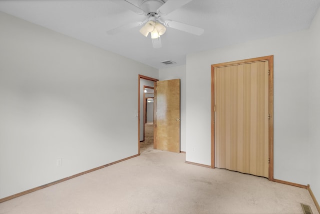 3563 S Western Ave, Springfield, MO 65807 - unfurnished bedroom with carpet floors, a closet, baseboards, and a ceiling fan