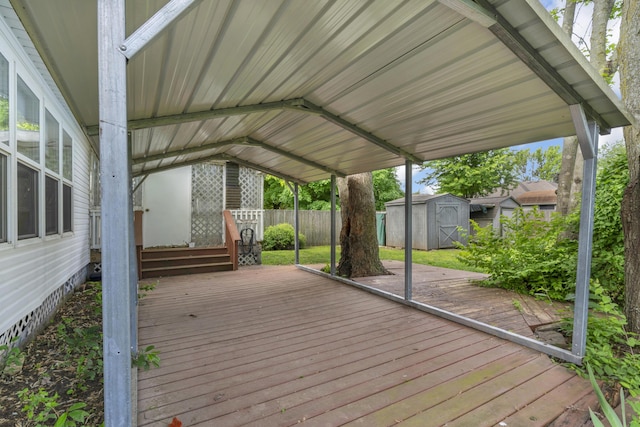 3563 S Western Ave, Springfield, MO 65807 - wooden deck featuring a shed, fence, and an outdoor structure