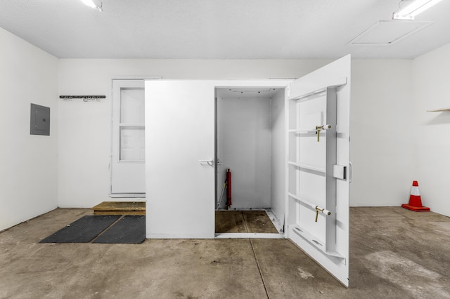 3563 S Western Ave, Springfield, MO 65807 - unfurnished bedroom with unfinished concrete floors and electric panel