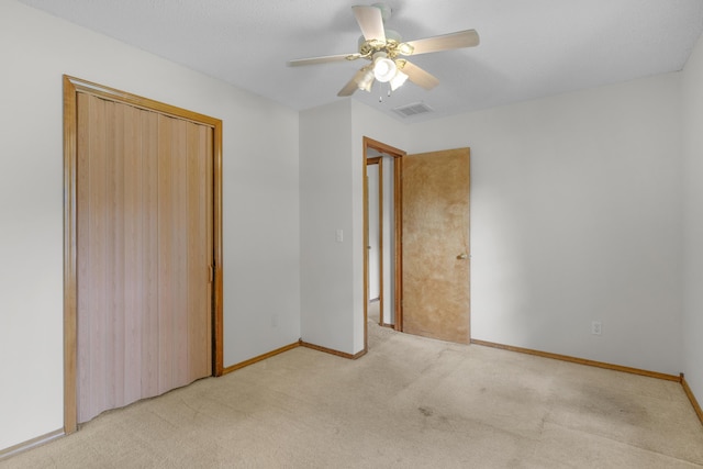 3563 S Western Ave, Springfield, MO 65807 - unfurnished bedroom featuring light colored carpet, baseboards, a ceiling fan, and a closet