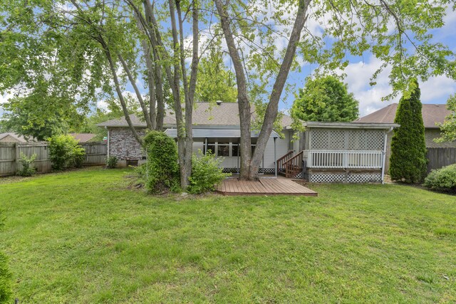 3563 S Western Ave, Springfield, MO 65807 - rear view of house featuring a deck and a sunroom