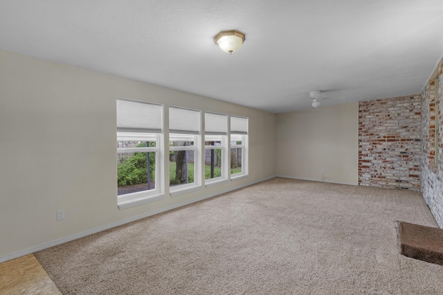 3563 S Western Ave, Springfield, MO 65807 - empty room with carpet, ceiling fan, and baseboards