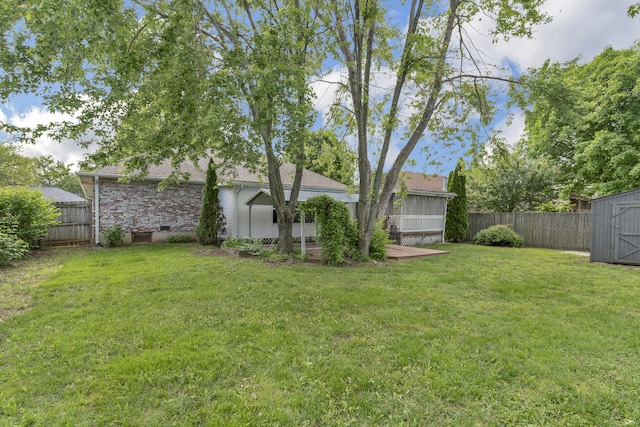 3563 S Western Ave, Springfield, MO 65807 - view of yard featuring a storage shed and an outbuilding
