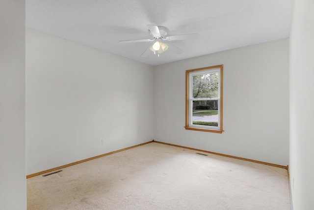 3563 S Western Ave, Springfield, MO 65807 - unfurnished room featuring carpet floors, baseboards, and a ceiling fan