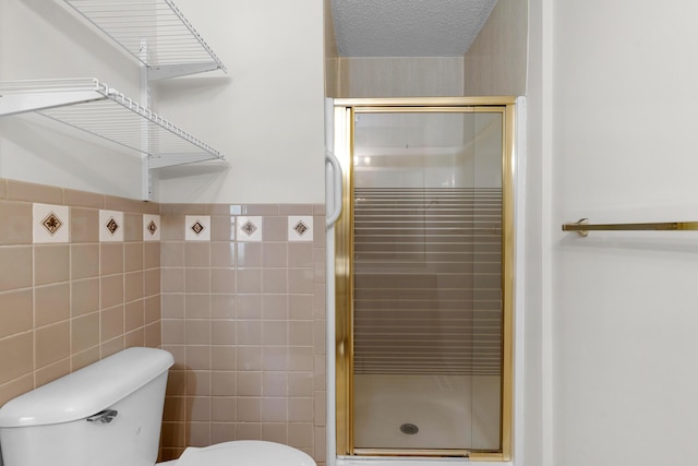 3563 S Western Ave, Springfield, MO 65807 - full bath with tile walls, a shower stall, and toilet