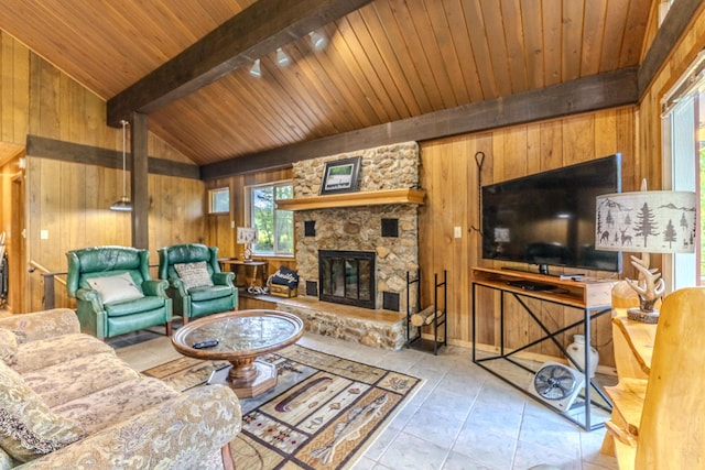 living room with wooden walls, wood ceiling, a fireplace, and tile patterned flooring