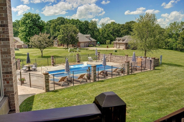 community pool with a patio area